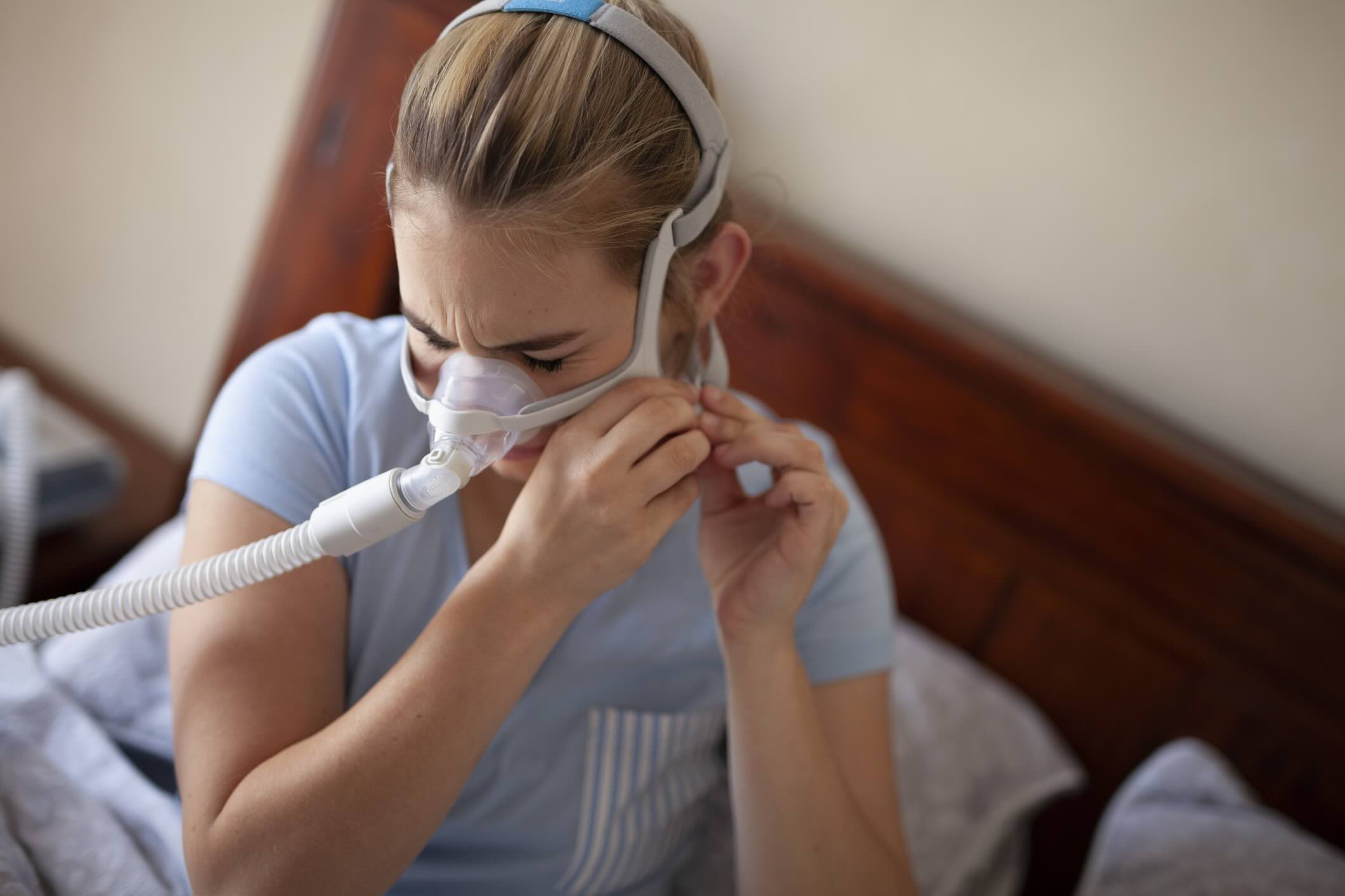Cpap for Sleep Apnea on Woman in Bedroom